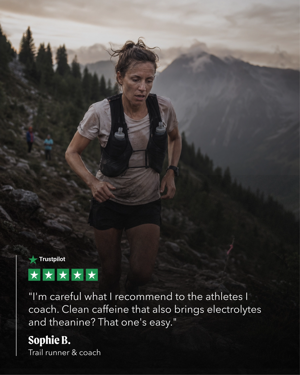 A trail runner wearing a black hydration vest and athletic gear is shown running on a rocky mountain slope with a forest and distant peaks in the background. A quote from Sophie B.